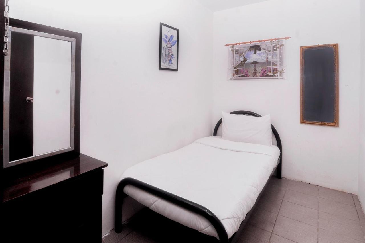 Spot On 89886 Backpacker'S Stay Services Kuching Bagian luar foto