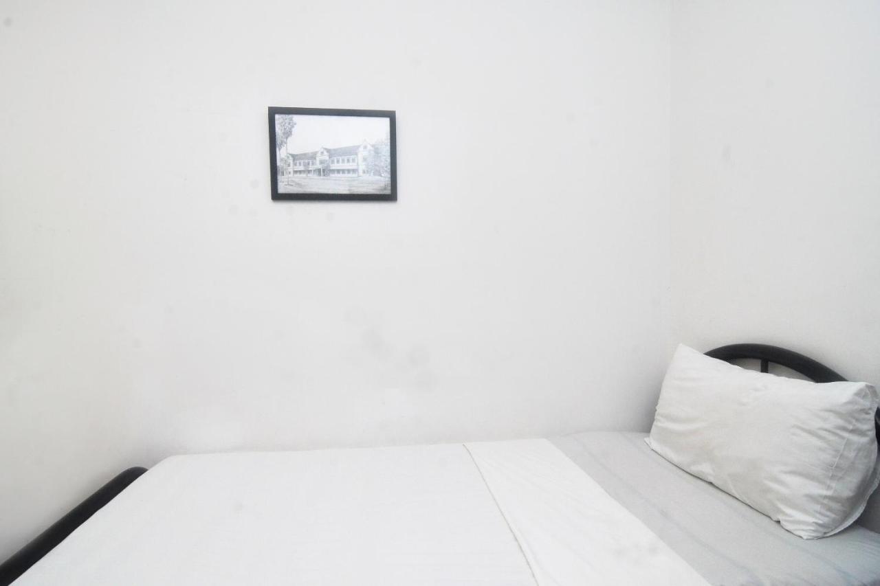Spot On 89886 Backpacker'S Stay Services Kuching Bagian luar foto