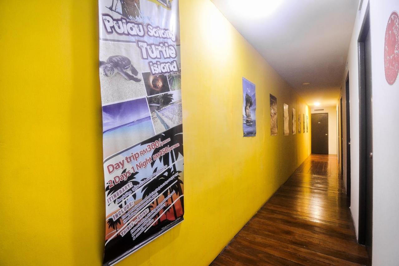 Spot On 89886 Backpacker'S Stay Services Kuching Bagian luar foto