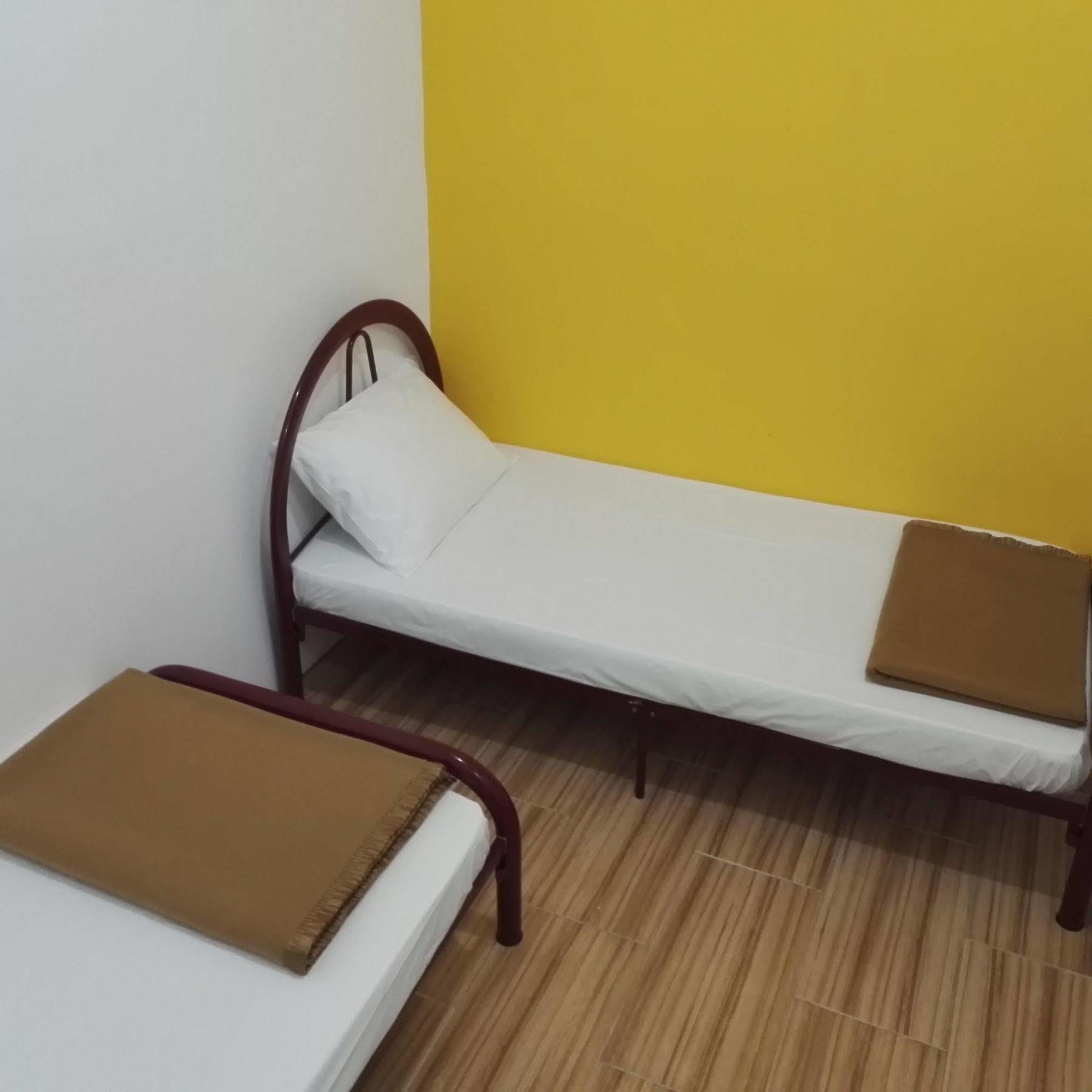 Spot On 89886 Backpacker'S Stay Services Kuching Bagian luar foto